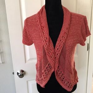 Cute cover up/ light sweater in coral color.